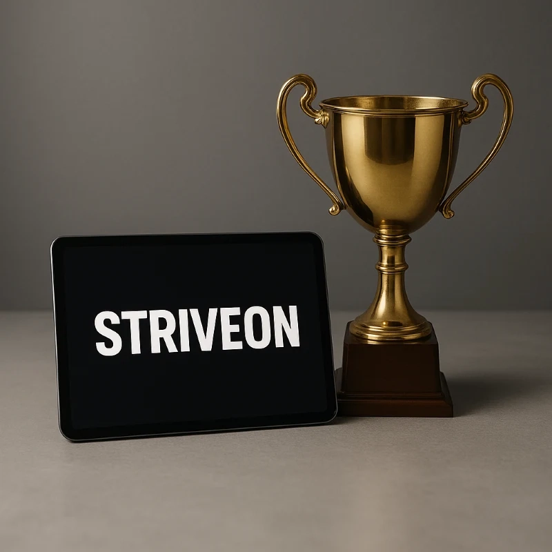 Golden trophy next to tablet displaying Striveon branding, symbolizing the winning combination of professional coaching tools and championship-level success that comes from organized, efficient team management